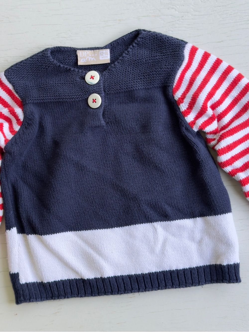 DP am Navy & WhiteKnit Pullover with Red Stripe Sleeves - Baby Sz 12-18 months.